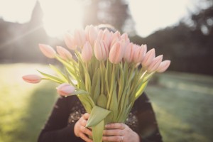 Jo Truby with a bunch of pink tulips